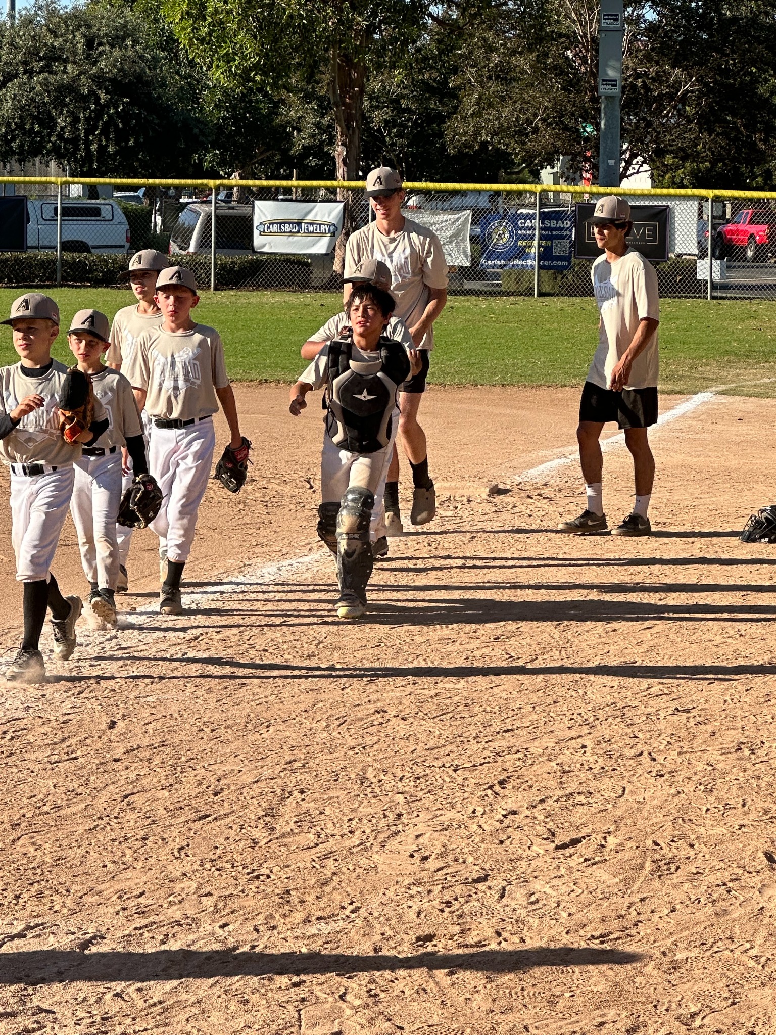 Robert Bering coaching youth baseball